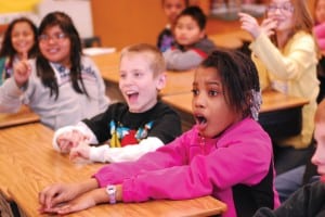 Students react to a live wolf howl